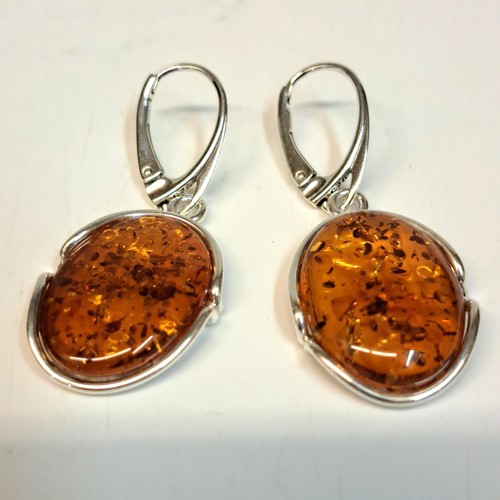 Click to view detail for HWG-2421 Earrings, Oval, Rum Amber, Irregular Shape in Silver $70